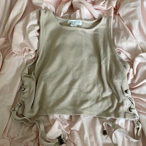 Forever 21 crop top size large color tan with ties on the side
